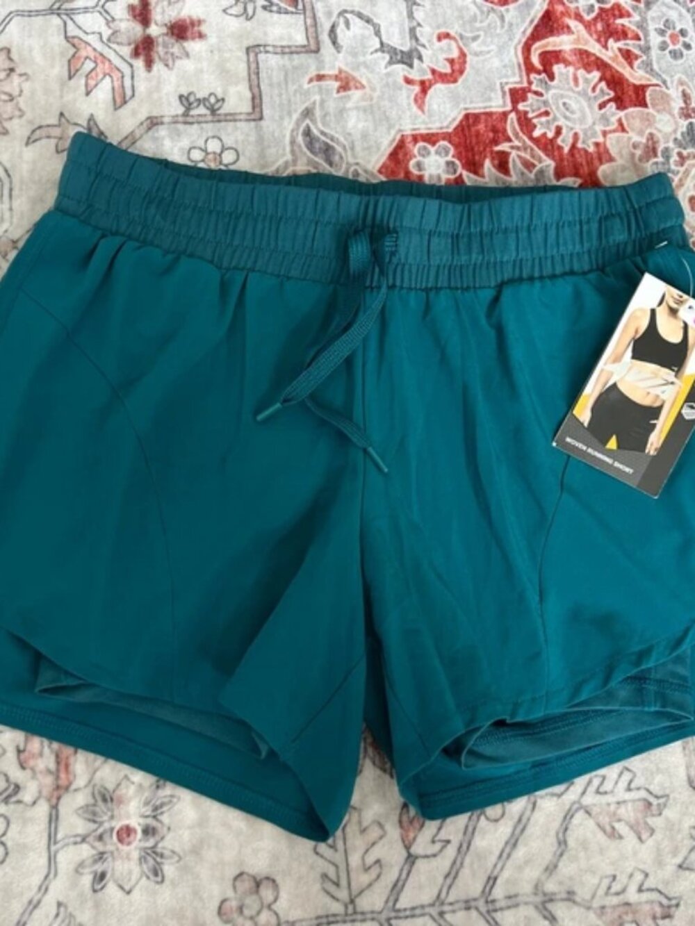 Avia running short. size XS. teal green